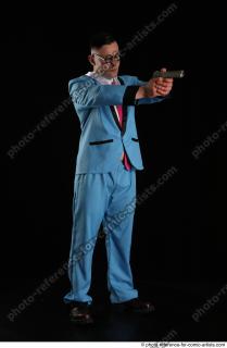 07 2018 01 MICHAL AGENT STANDING POSE WITH GUN